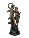 Painted bronze sculpture of young boy and girl